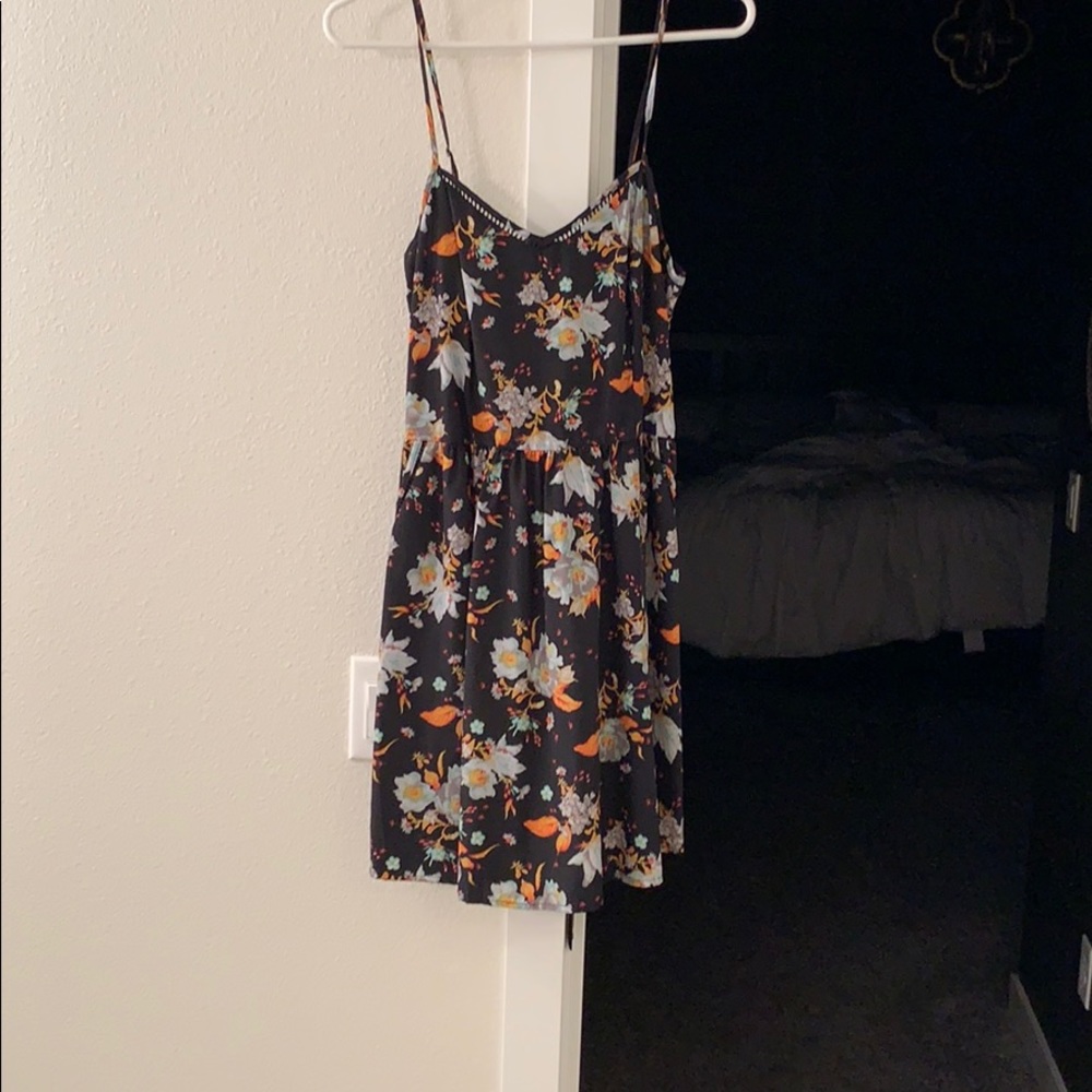 Can be worn as a dress or a top.